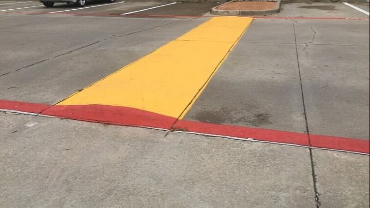 Yellow speed bump in your parking lot in Palmetto Bay, Florida
